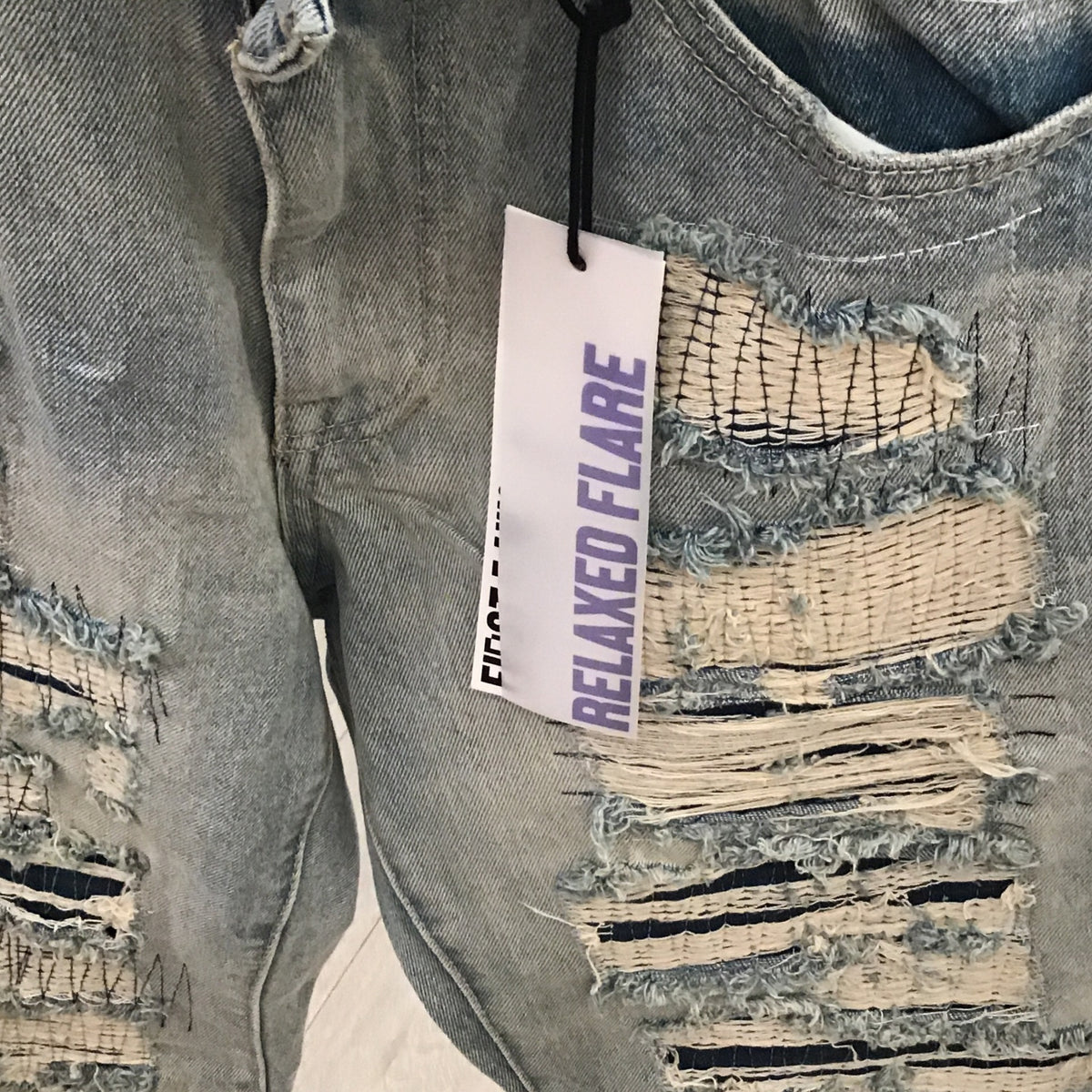 First row Khaki Ripped
