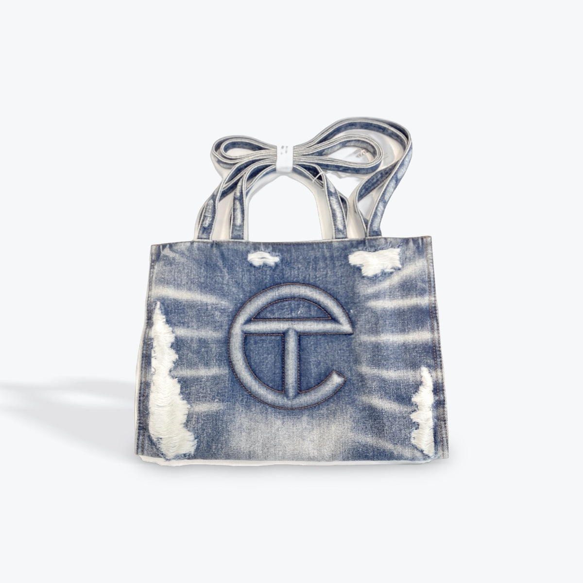Telfar blue denim bag medium